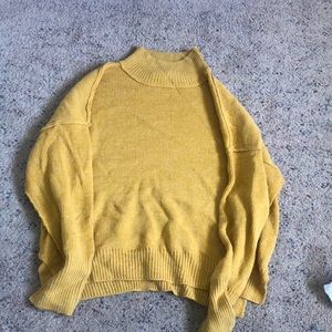 Yellow turtle neck sweater